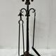 20th century wrought iron and bronze fireplace set