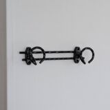 Wrought iron wall coat rack
