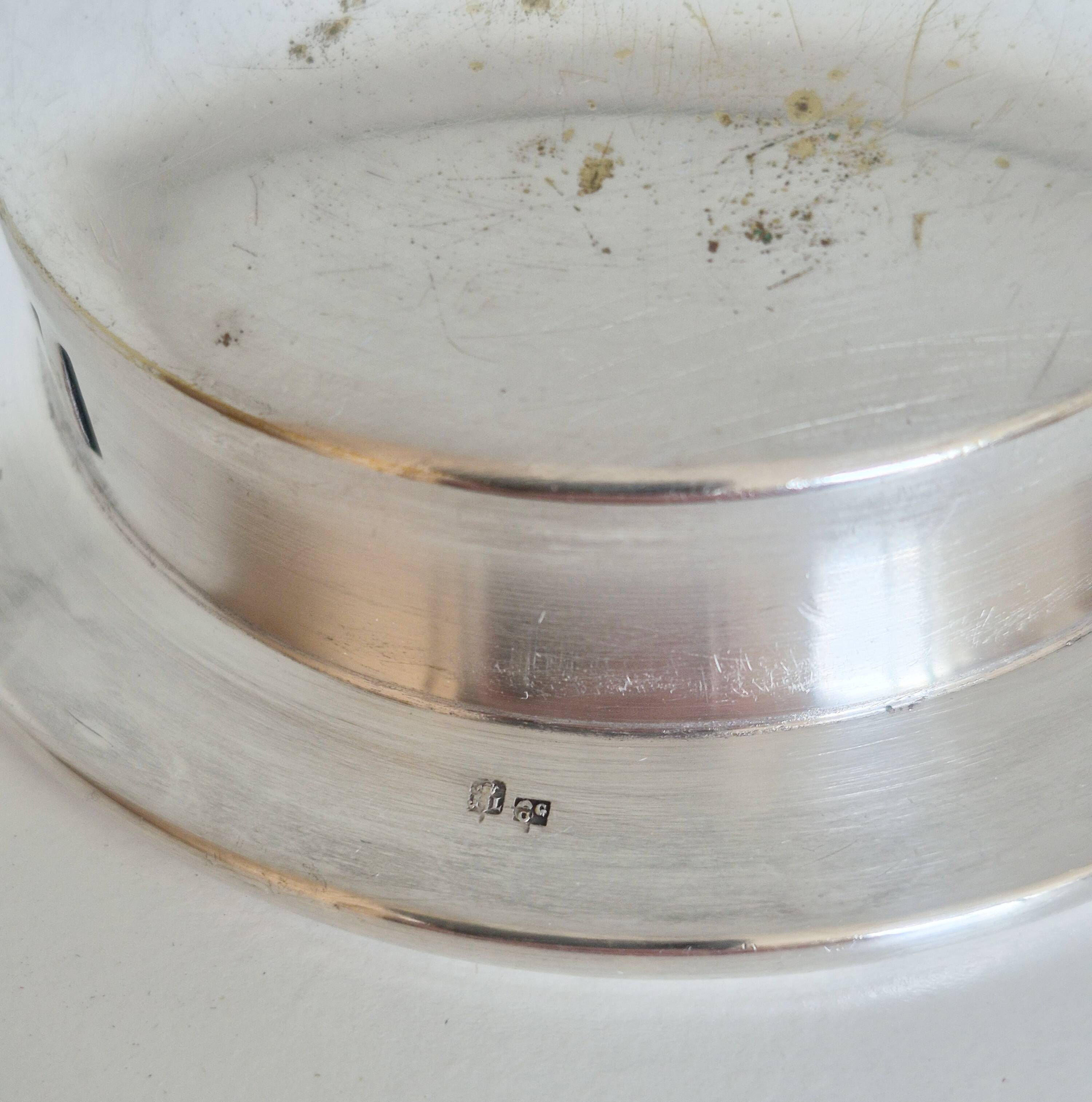 Silver scallop shell butter dish.