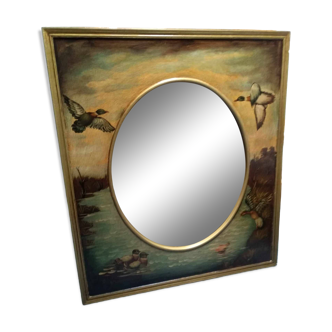 Oval mirror in duck pattern frame
