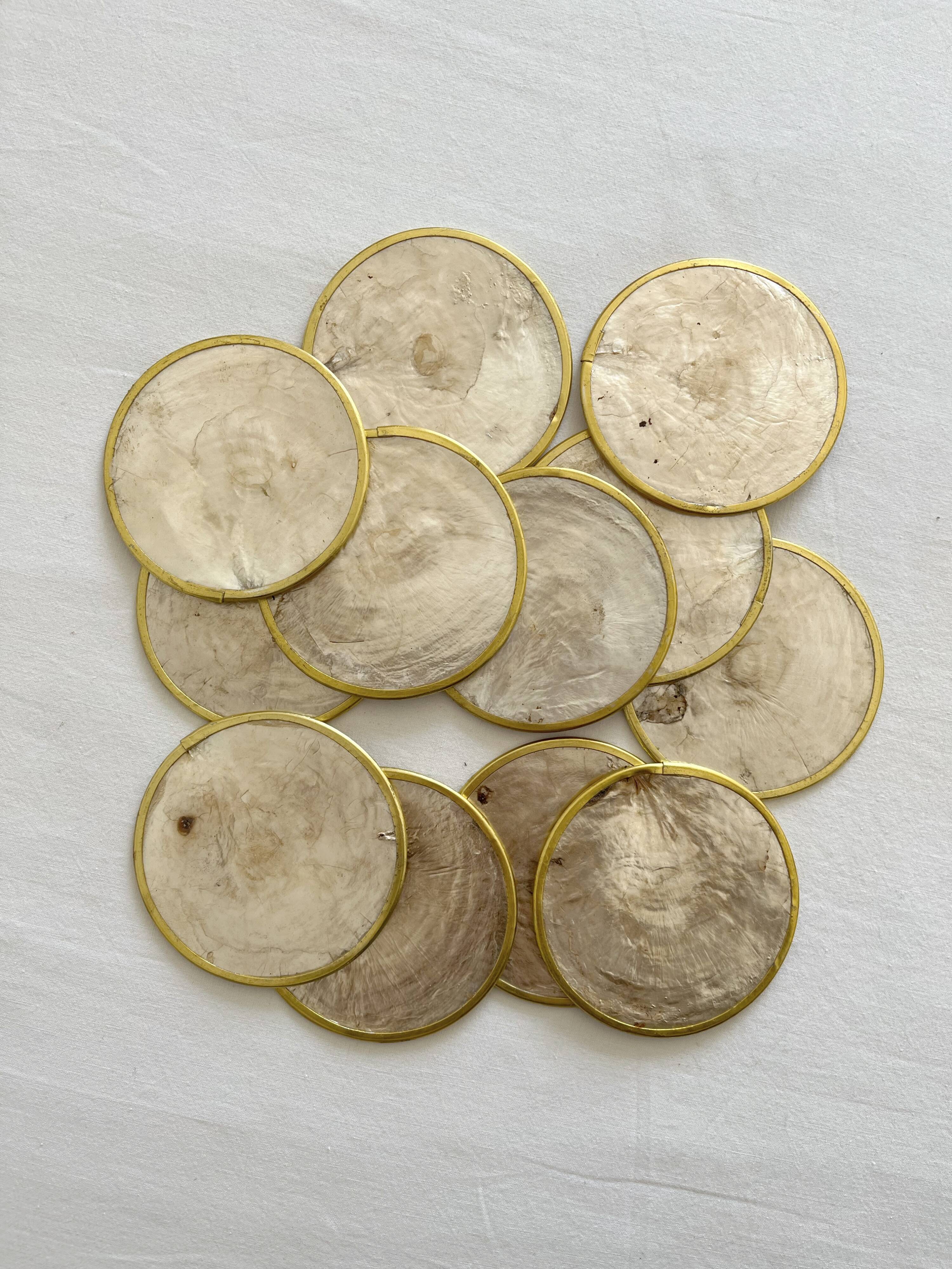 12 coasters in mother-of-pearl and vintage brass