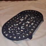 dessous de plat en fonte - ancien