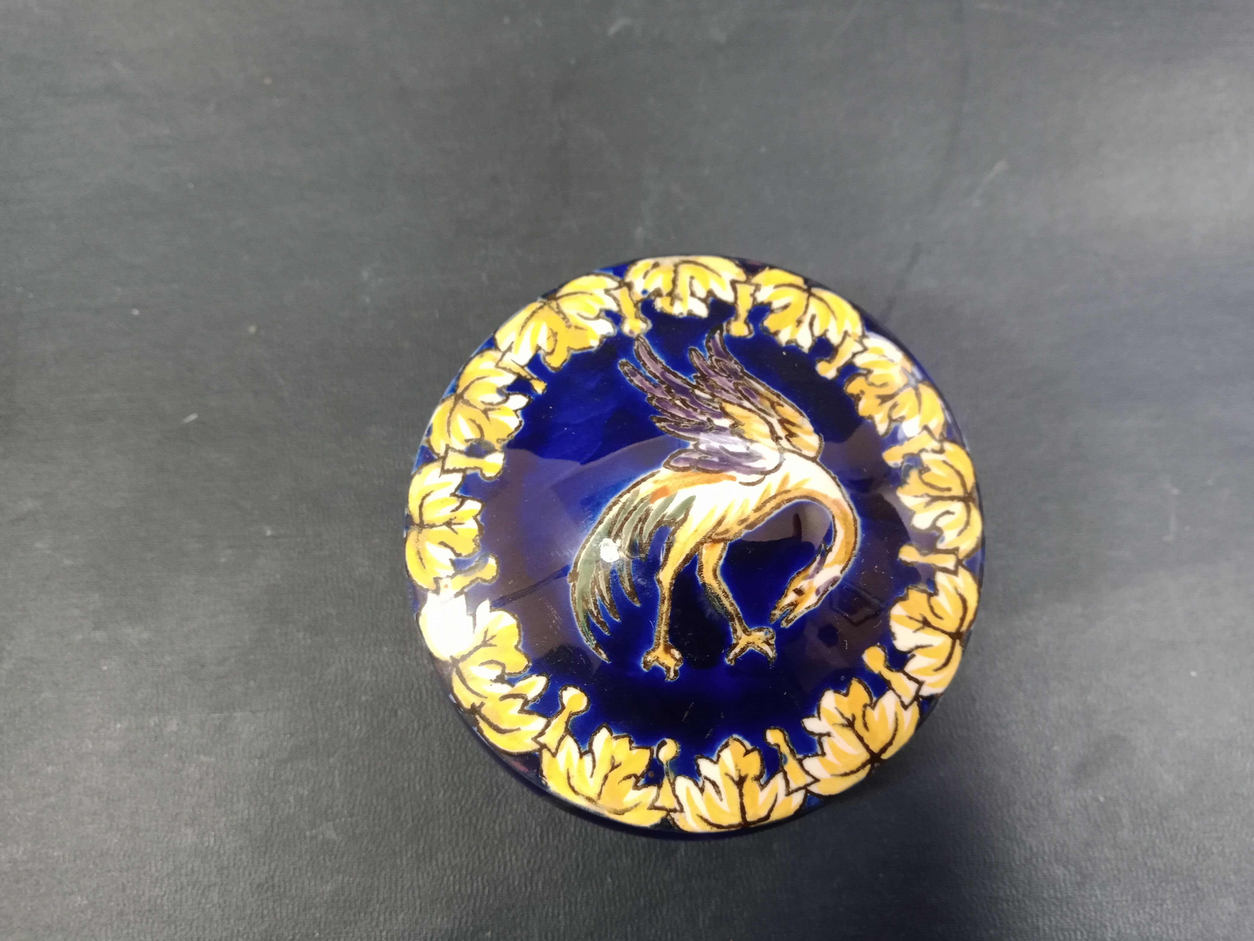 Empty Gien earthenware pocket decorated with chimera decoration