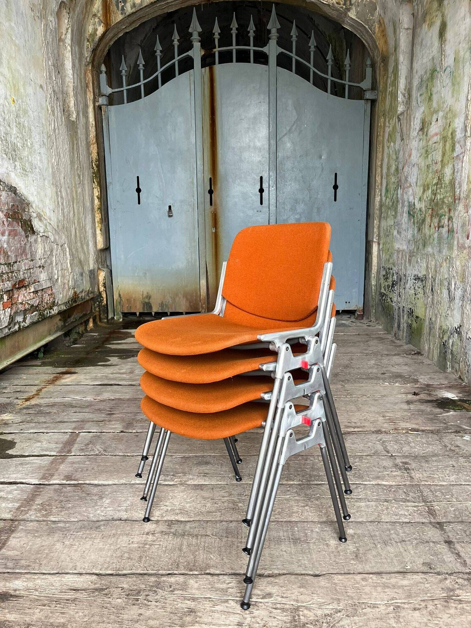 DSC 106 chair in orange by Giancarlo Piretti for Castelli, 1970s.