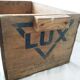 Ancienne caisse publicitaire en bois LUX
