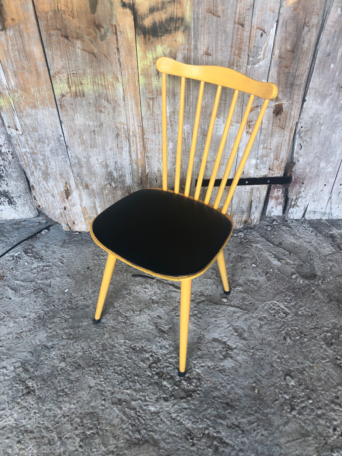 Baumann western style chair in yellow wood + vintage black skai seat
