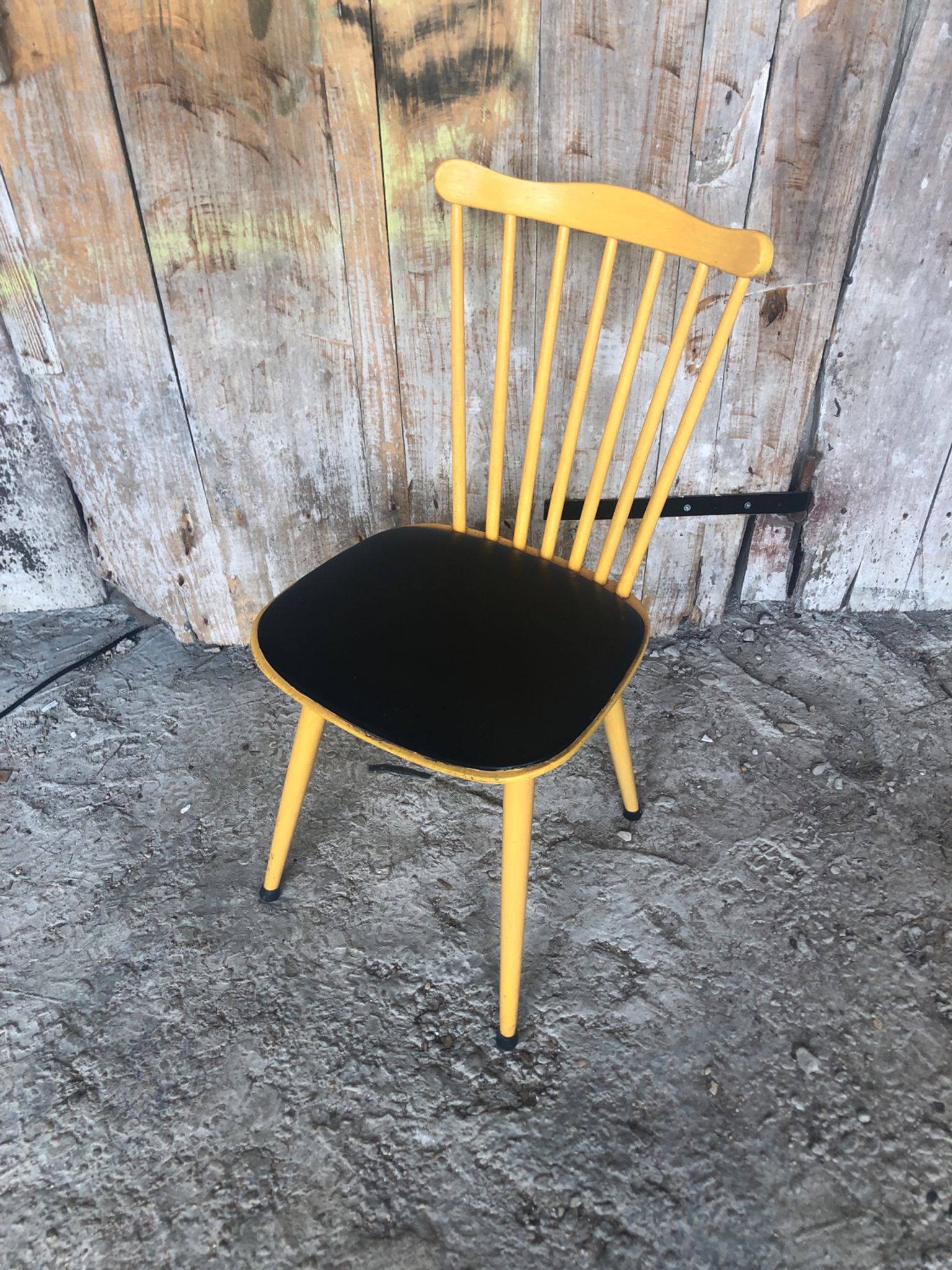 Baumann western style chair in yellow wood + vintage black skai seat