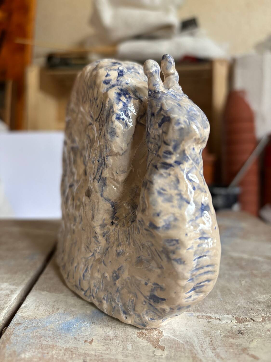 Blue and white ceramic snail