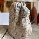 Blue and white ceramic snail