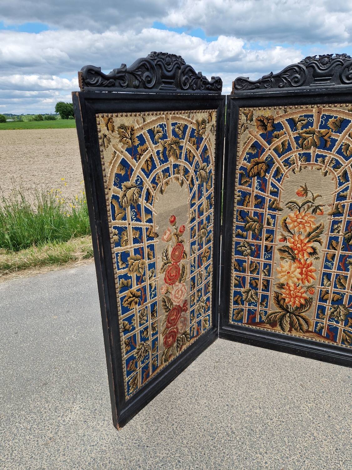 Folding screen in black-painted wood, 19th century