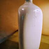 Triangular stoneware bottle
