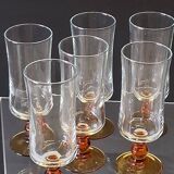 6 amber-footed champagne flutes in very good condition.