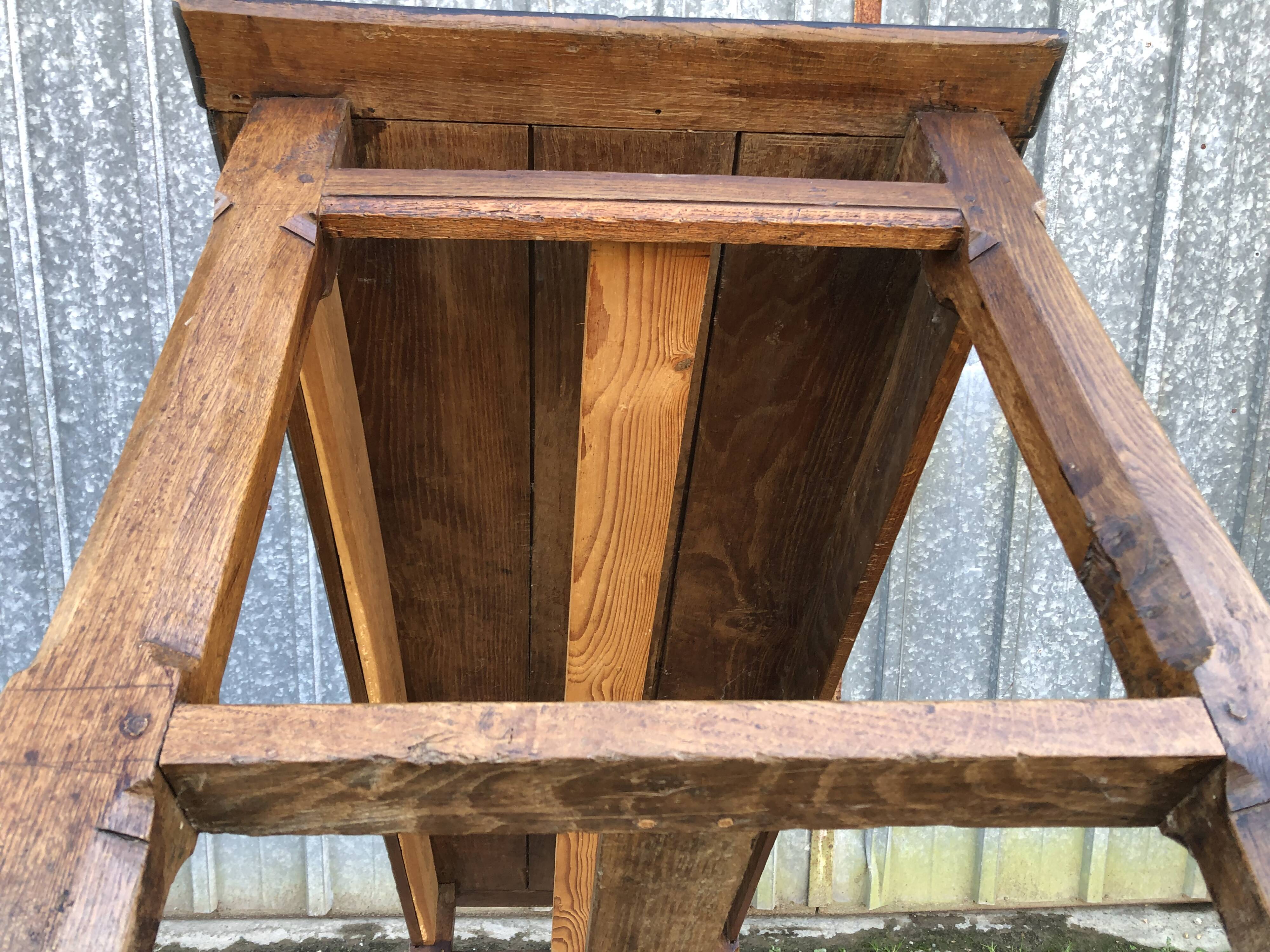 Antique oak farmhouse table with cat bar and 2 end drawers