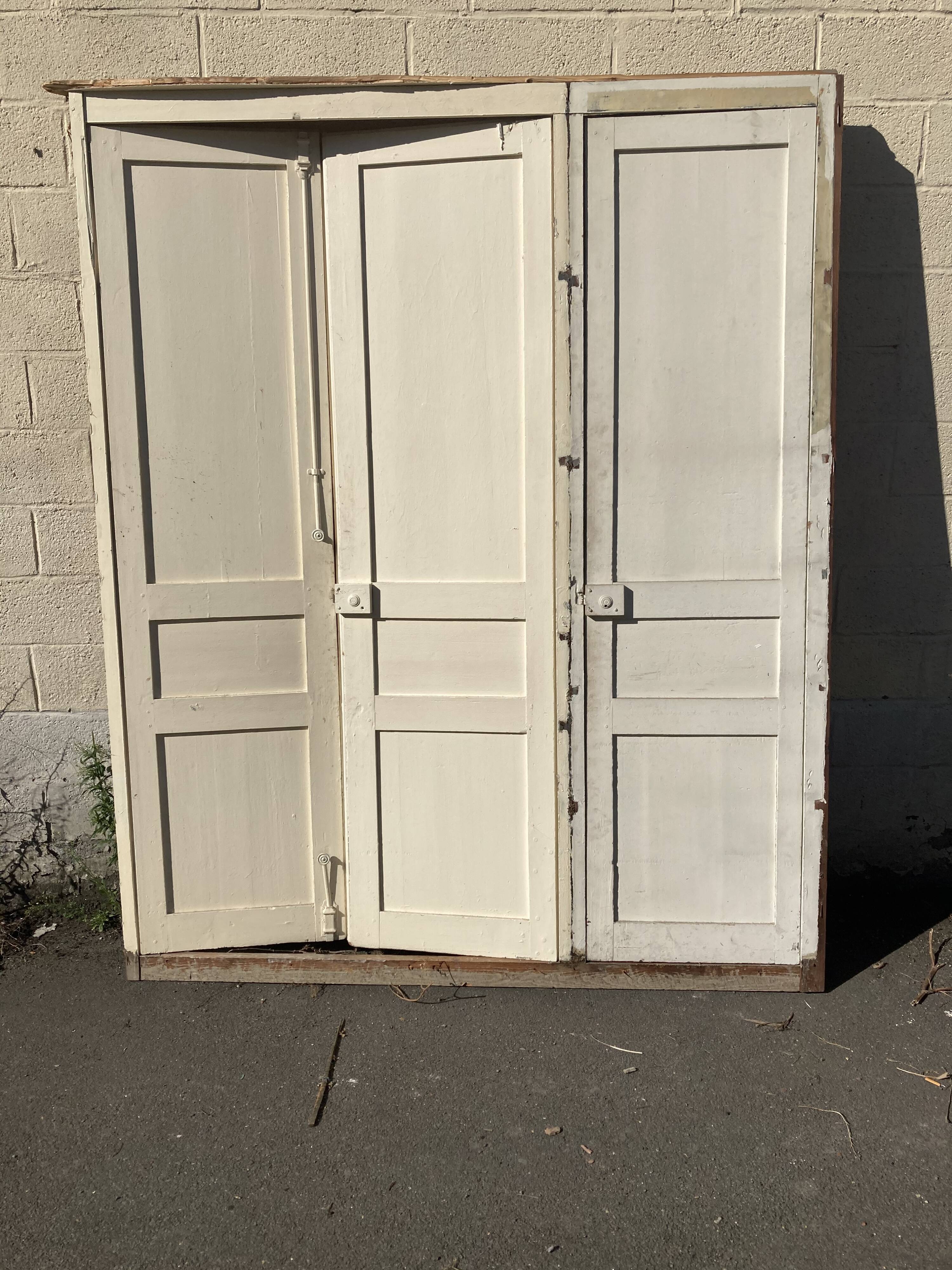 Old three-door closet