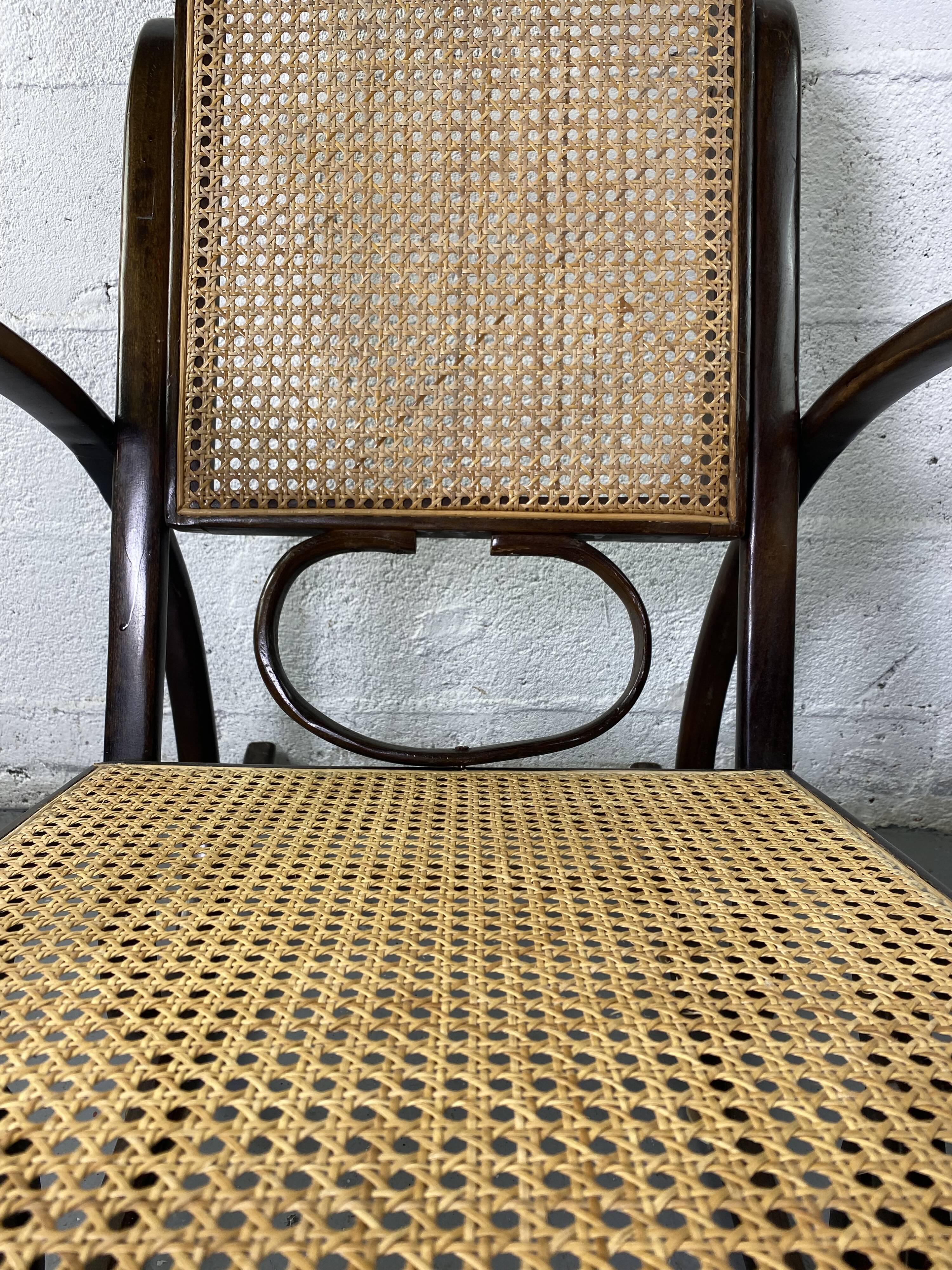 Rocking chair Chair in wood and Cannage from the 70s