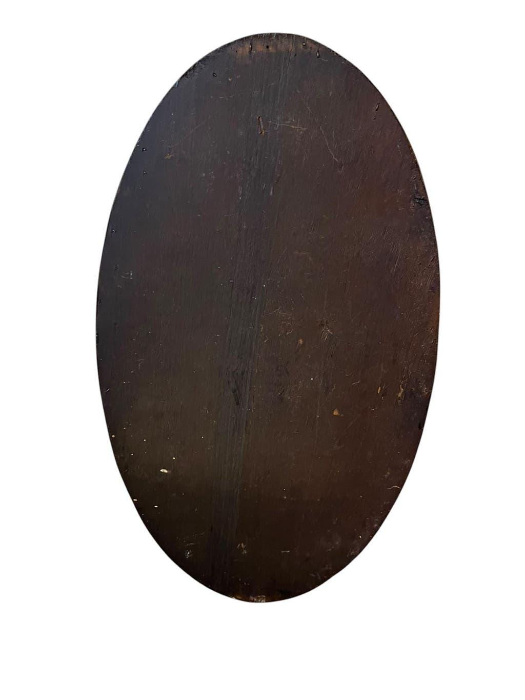 Robust vintage oval wall mirror in wood