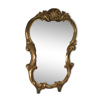 Golden wood mirror.