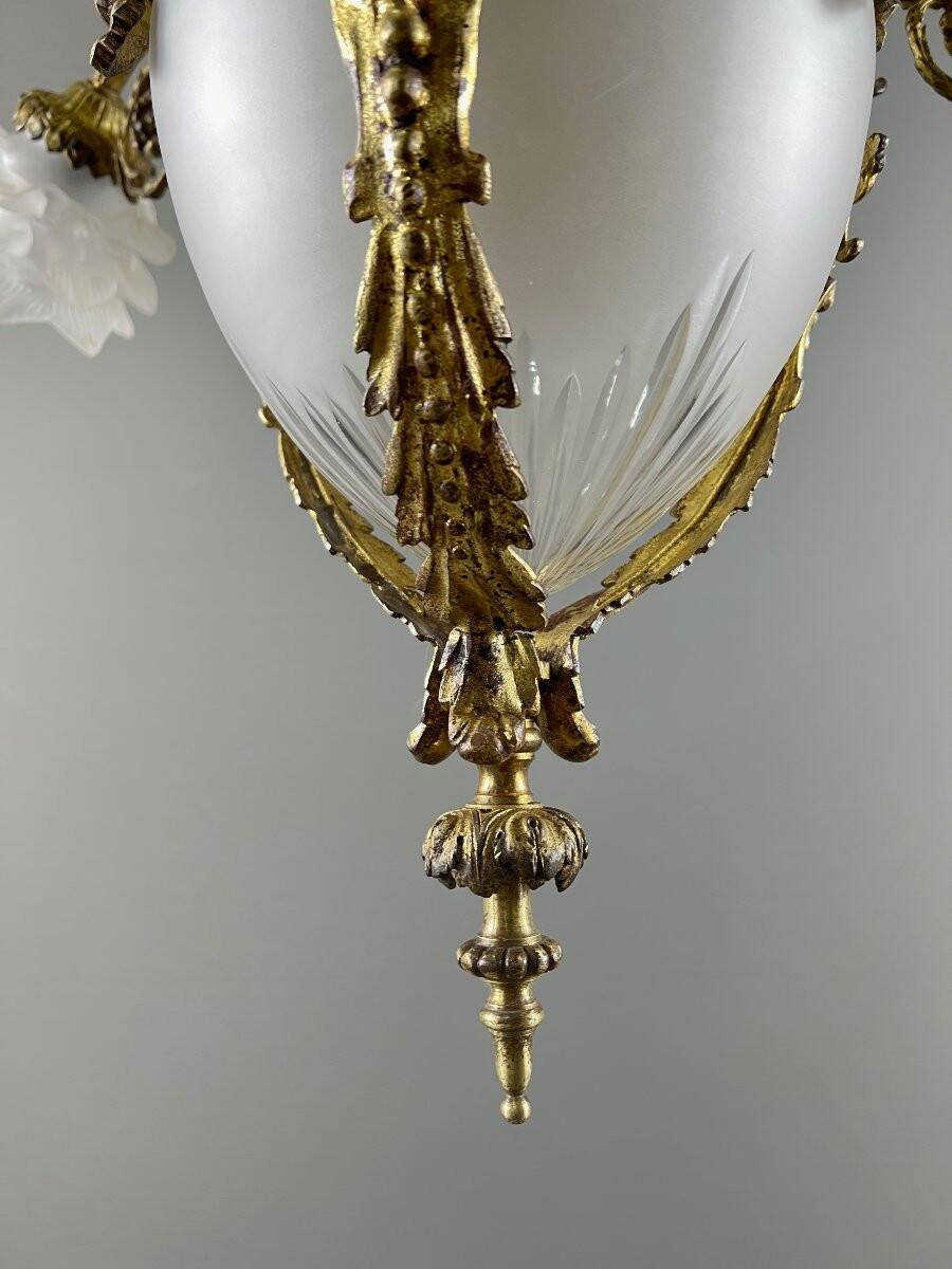 Louis XV style chandelier in bronze and glass, 19th century
