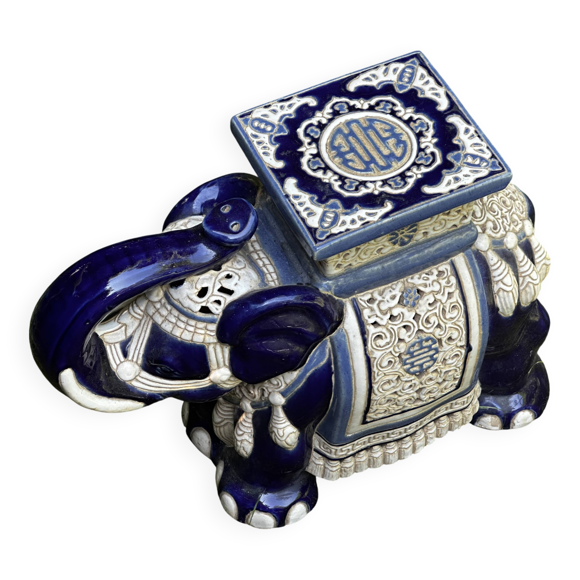 Elephant stool in glazed ceramic in cobalt blue and ivory colors