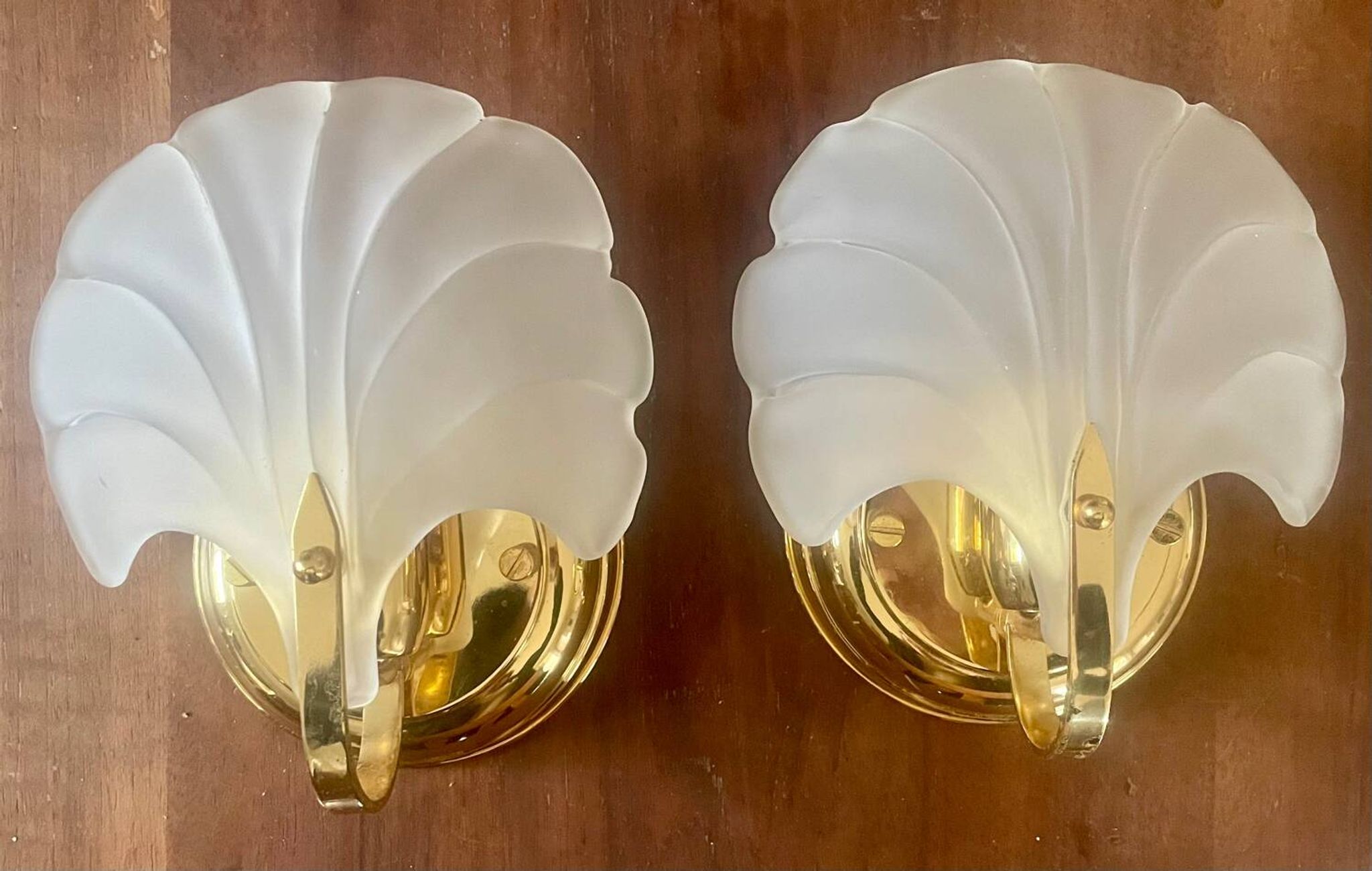 Pair of vintage polished glass shell sconces
