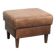 Sheepskin ottoman with a light brown colour scheme and a vintage look