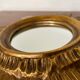 Vintage sun mirror in 60s/70s gold resin