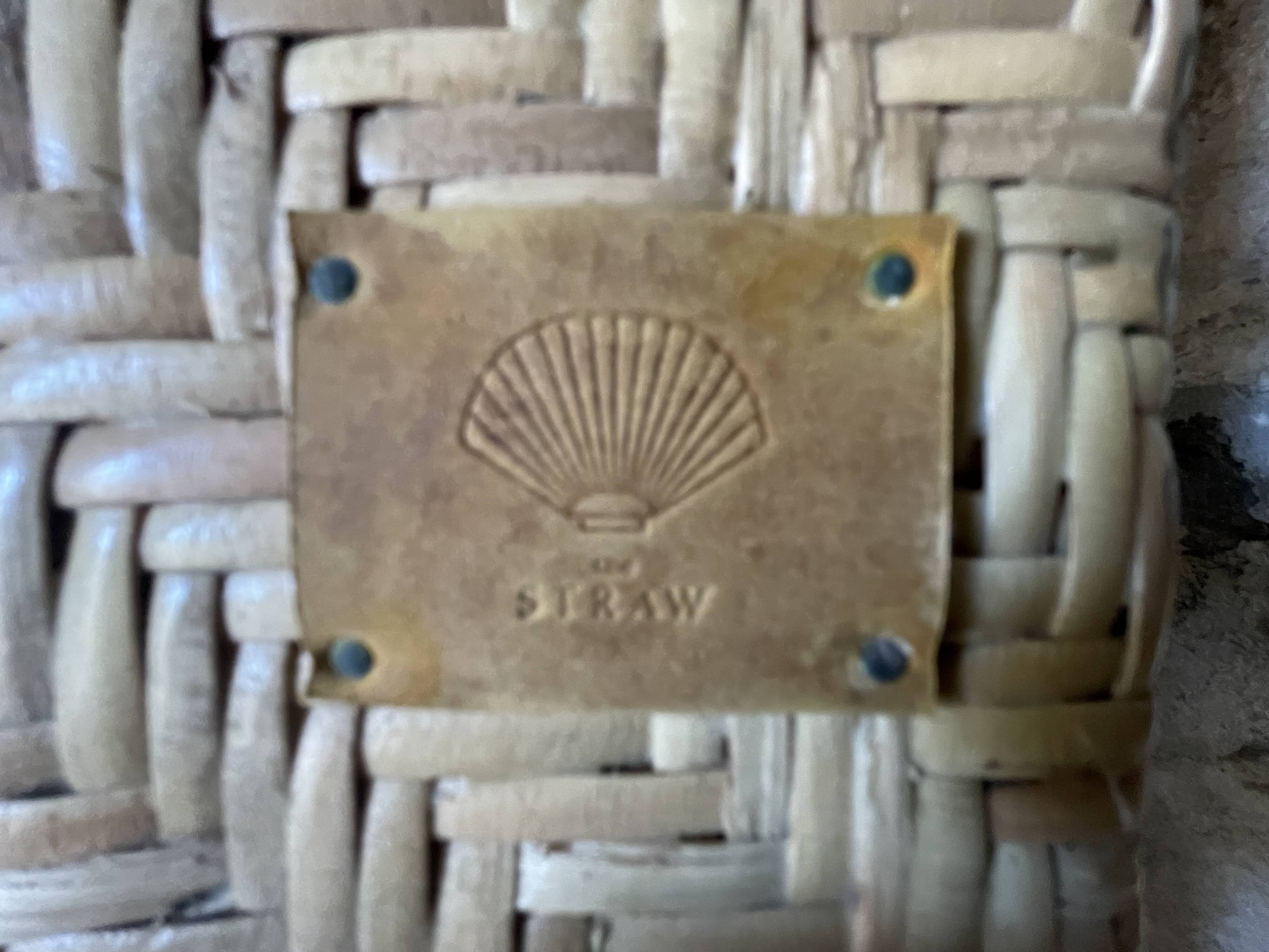 Two rattan garden chairs