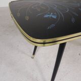 Vintage coffee table with glass top and angled legs, 1950s