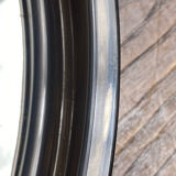 Circular mirror, smoked plastic, 1960s/70s.