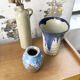 Enamelled sandstone vase