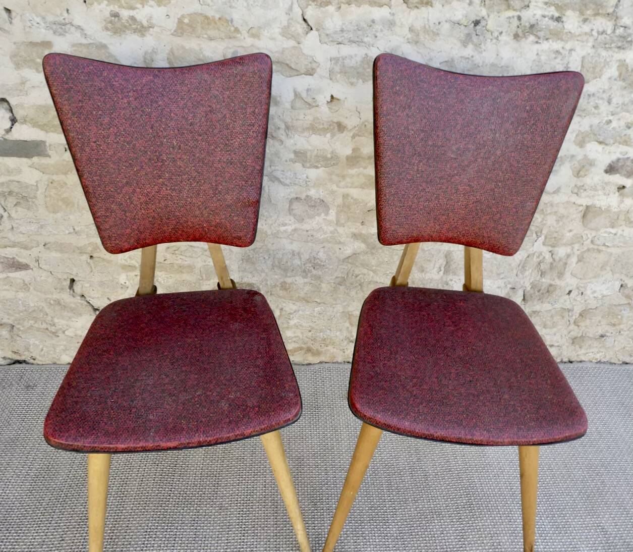 Pair of light wood chairs with Skai, around 1950.