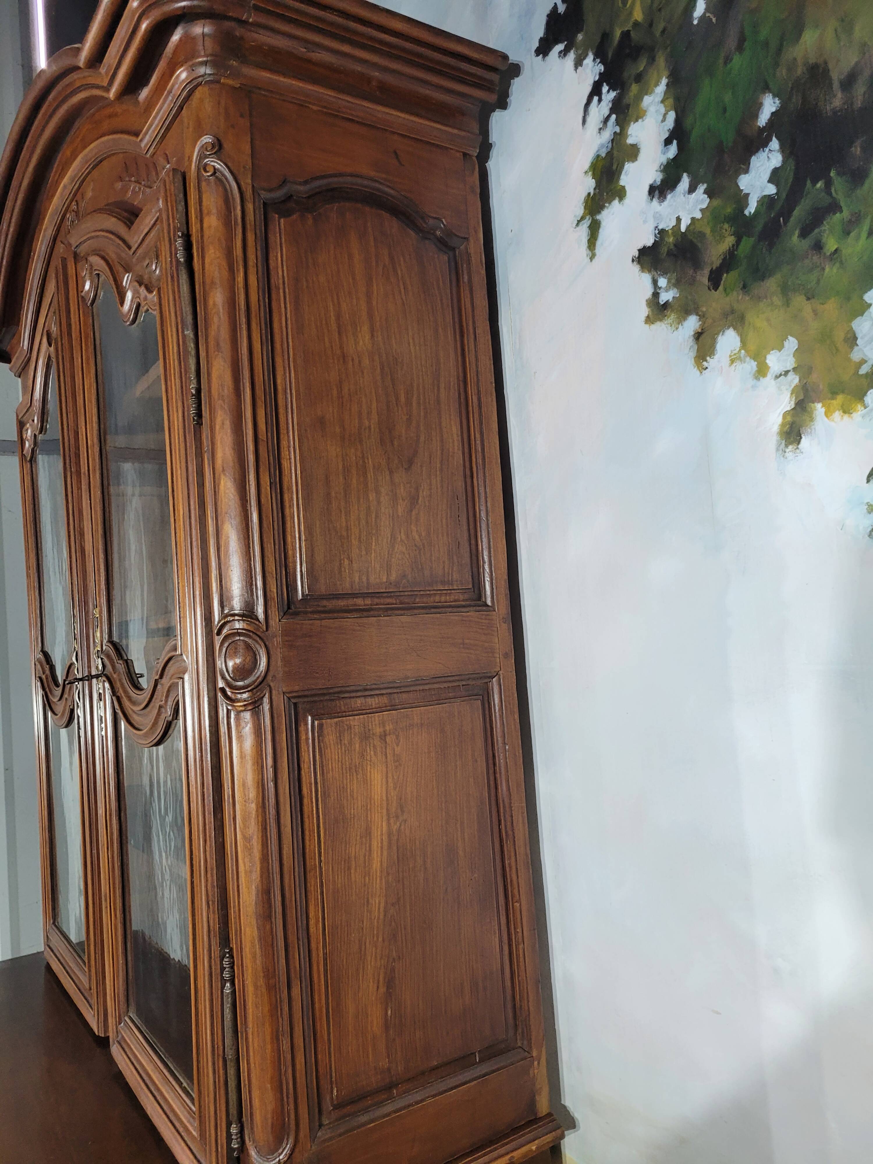 Louis XV period cherry wood sideboard with two glass panels