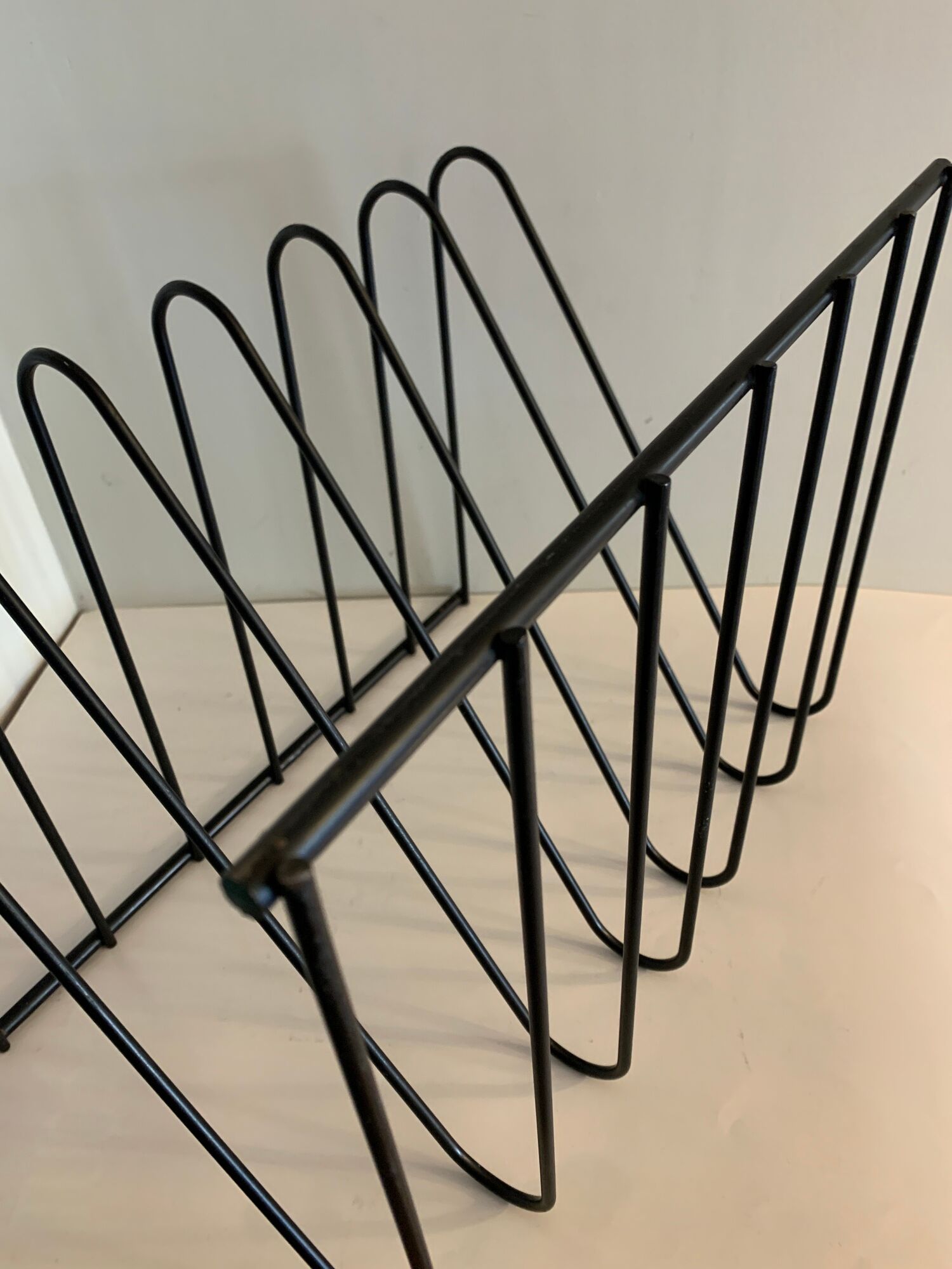 Magazine holder, black metal in Z, 1970