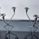 Pair of art deco stainless steel 3-flame candlesticks, Spain, 1970