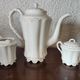 Limoges porcelain coffee maker in Haviland, white milk pot and sugar bowl decorated with leaves