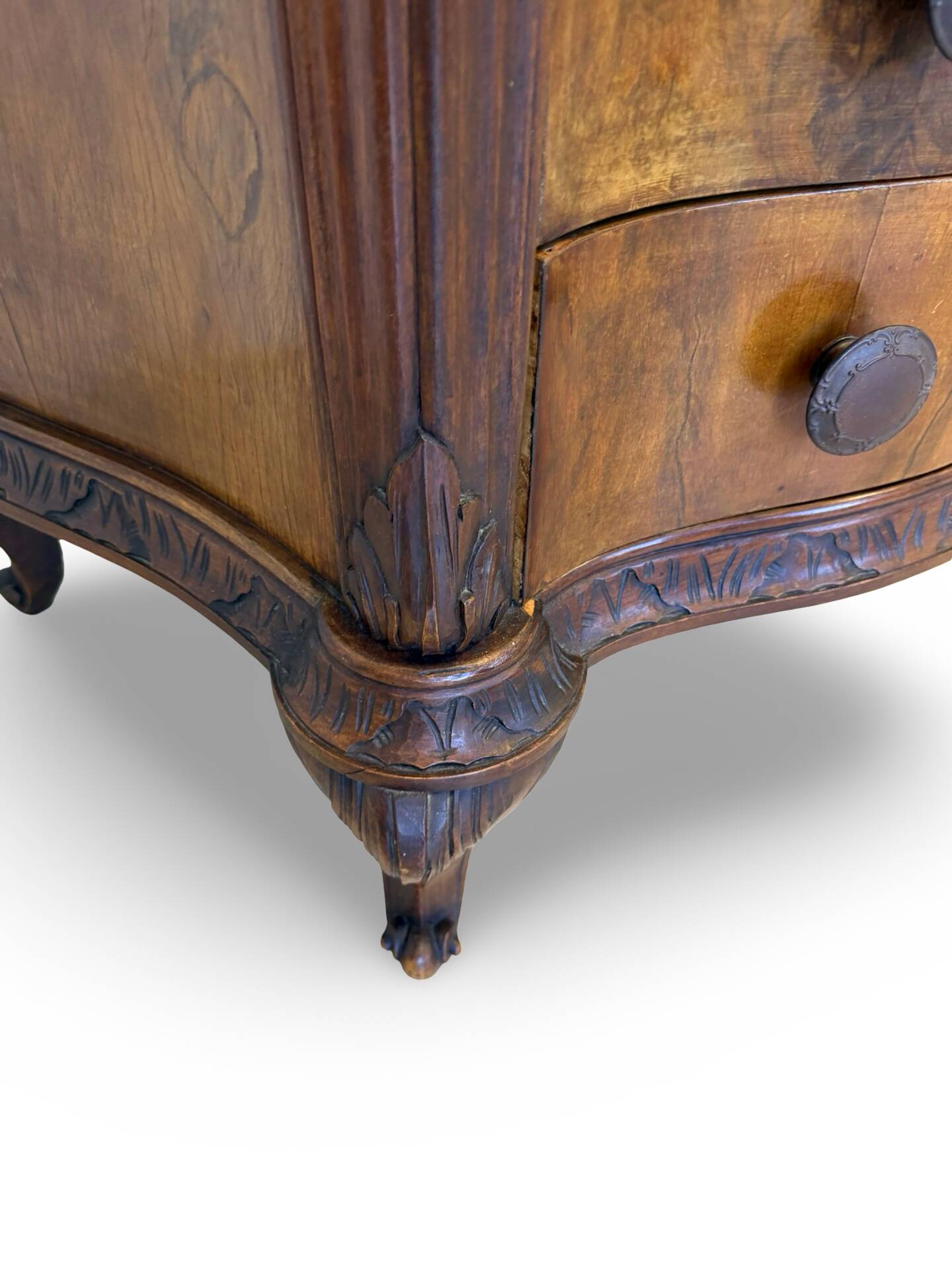 serpentine commode in antique walnut