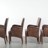 Set of 4 nicely finished dining chairs/side chairs with armrests made of cowhide leather