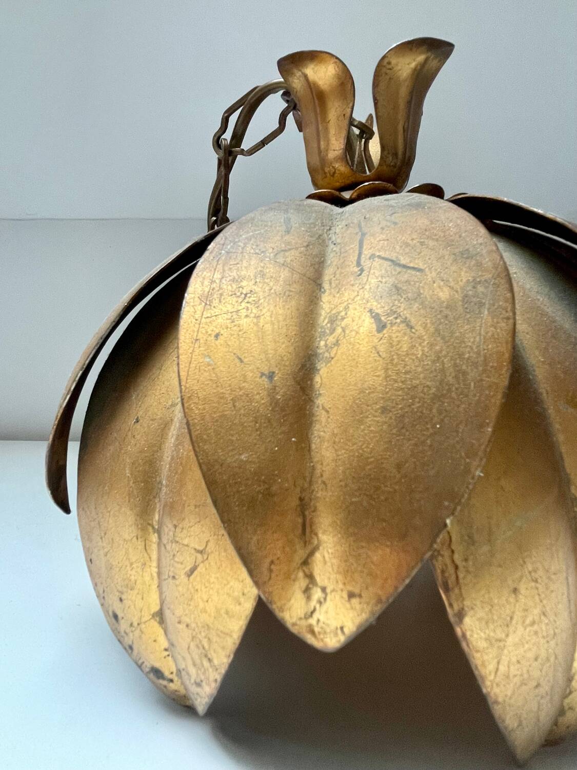 Two vintage pendant lights in gold metal