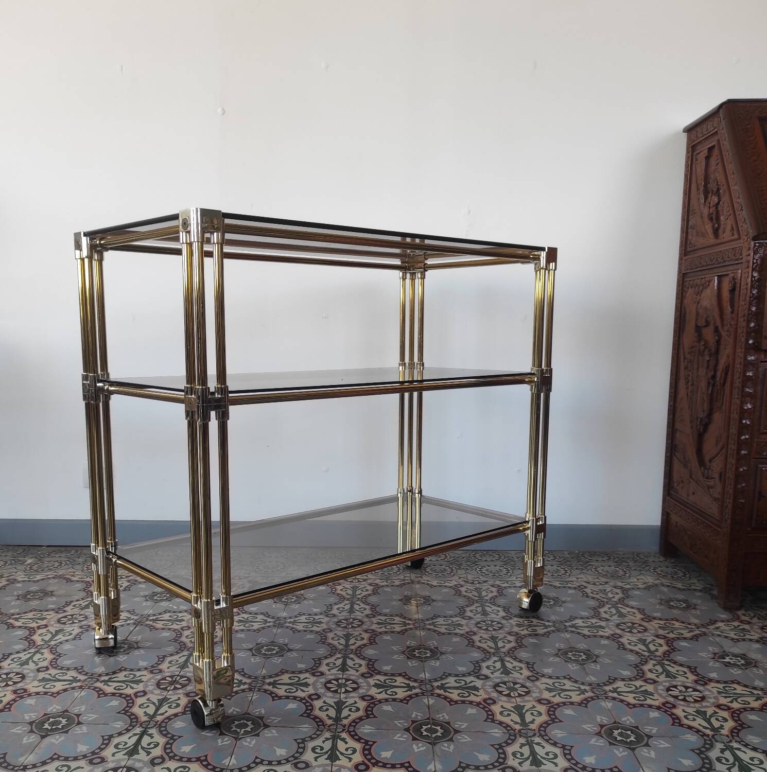 Dessert, vintage gold rolling bar, chrome and smoked glass.