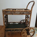 Bamboo and rattan dessert table in peacock style.