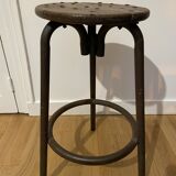 Old industrial stool in wood and metal