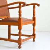 Ancien fauteuil en chêne et vinyle brutaliste