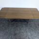 Modernist teak table with 2 extensions.