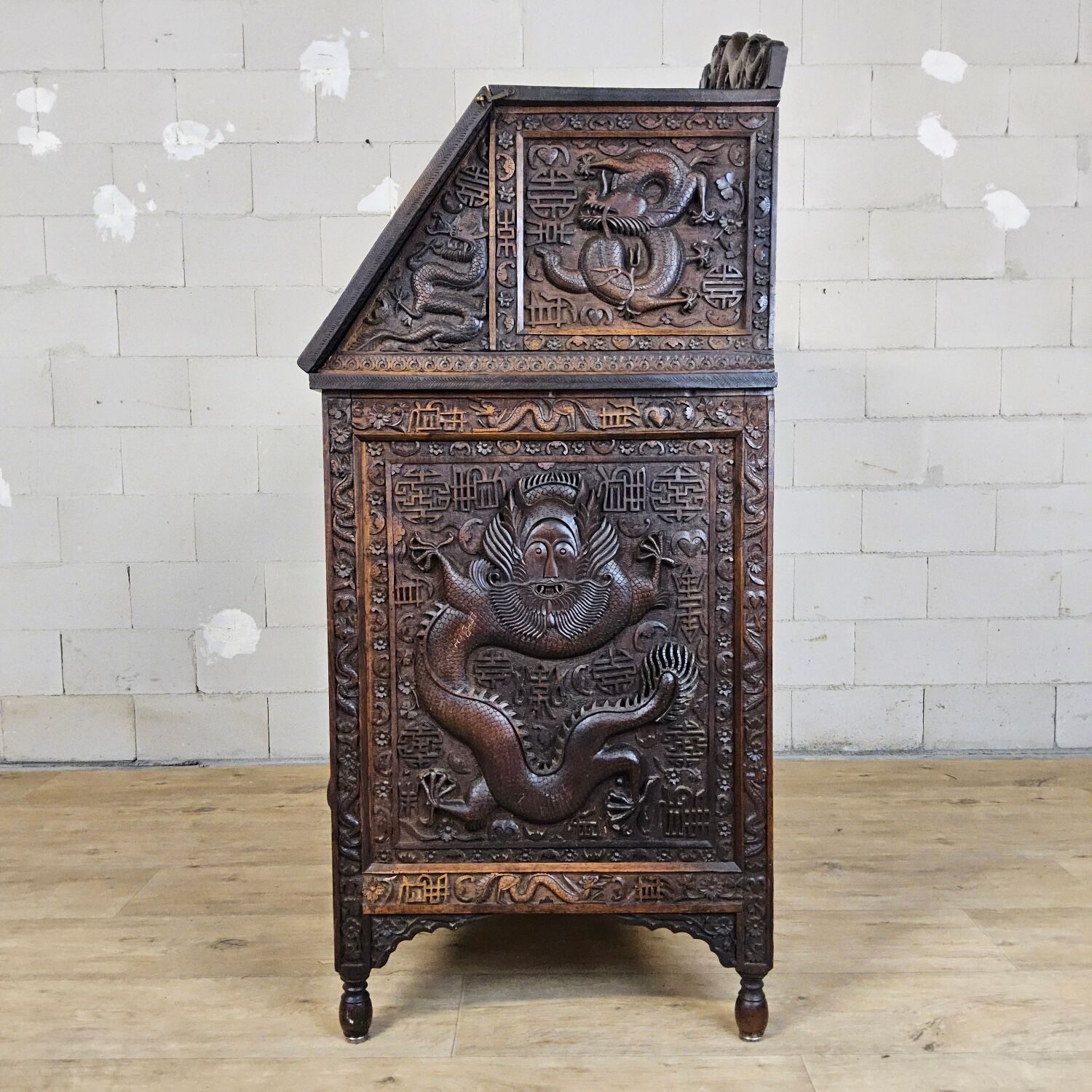 Antique 19th-century Chinese secretary with dragon woodcarving