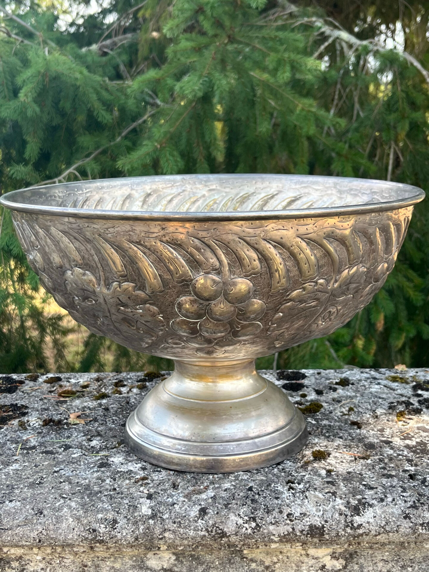 Large silver plated champagne cooler bowl on pedestal with grape
