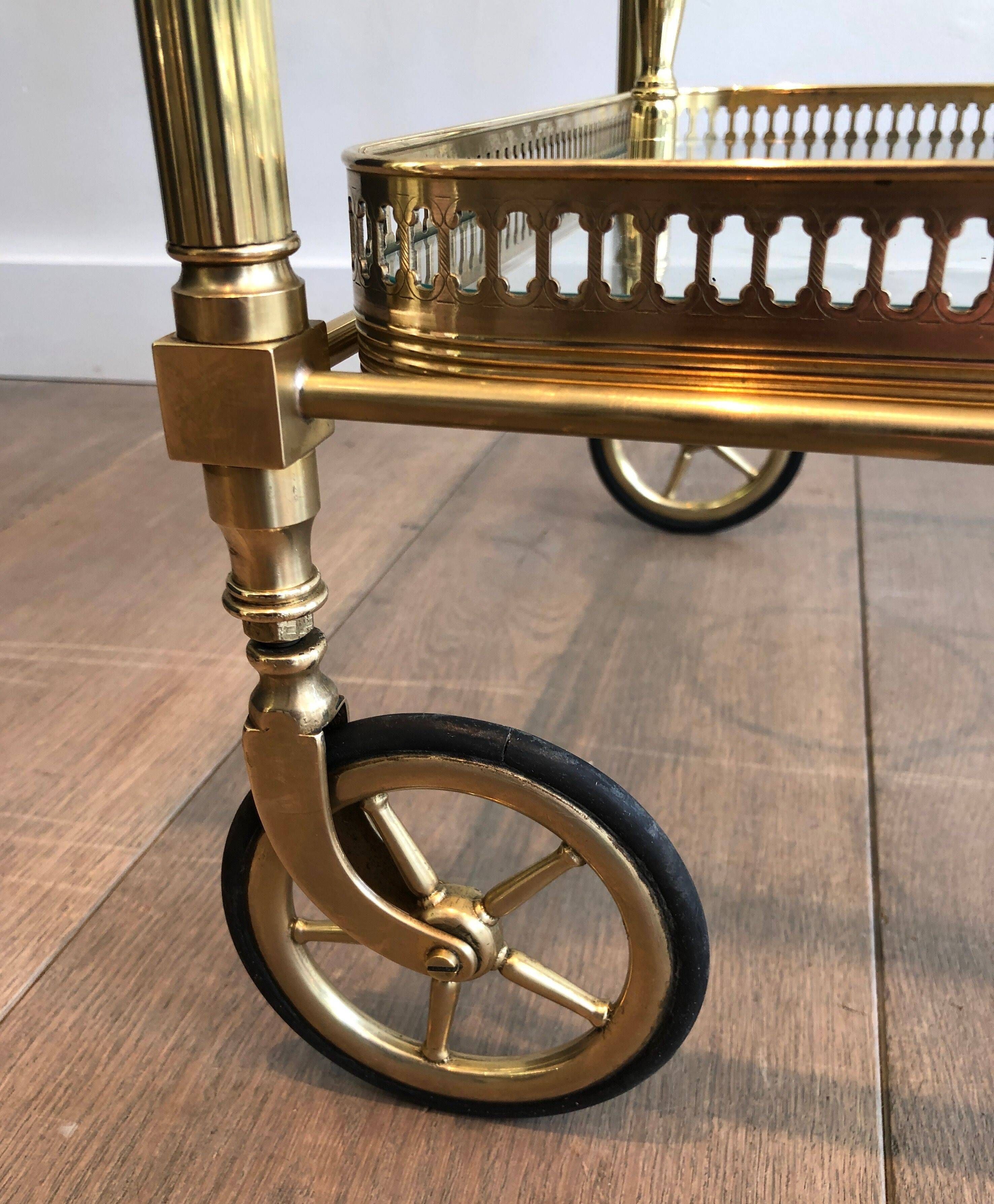 Brass rolling table with removable double trays from Maison Jansen.