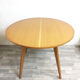 Table ronde pieds compas, 1960
