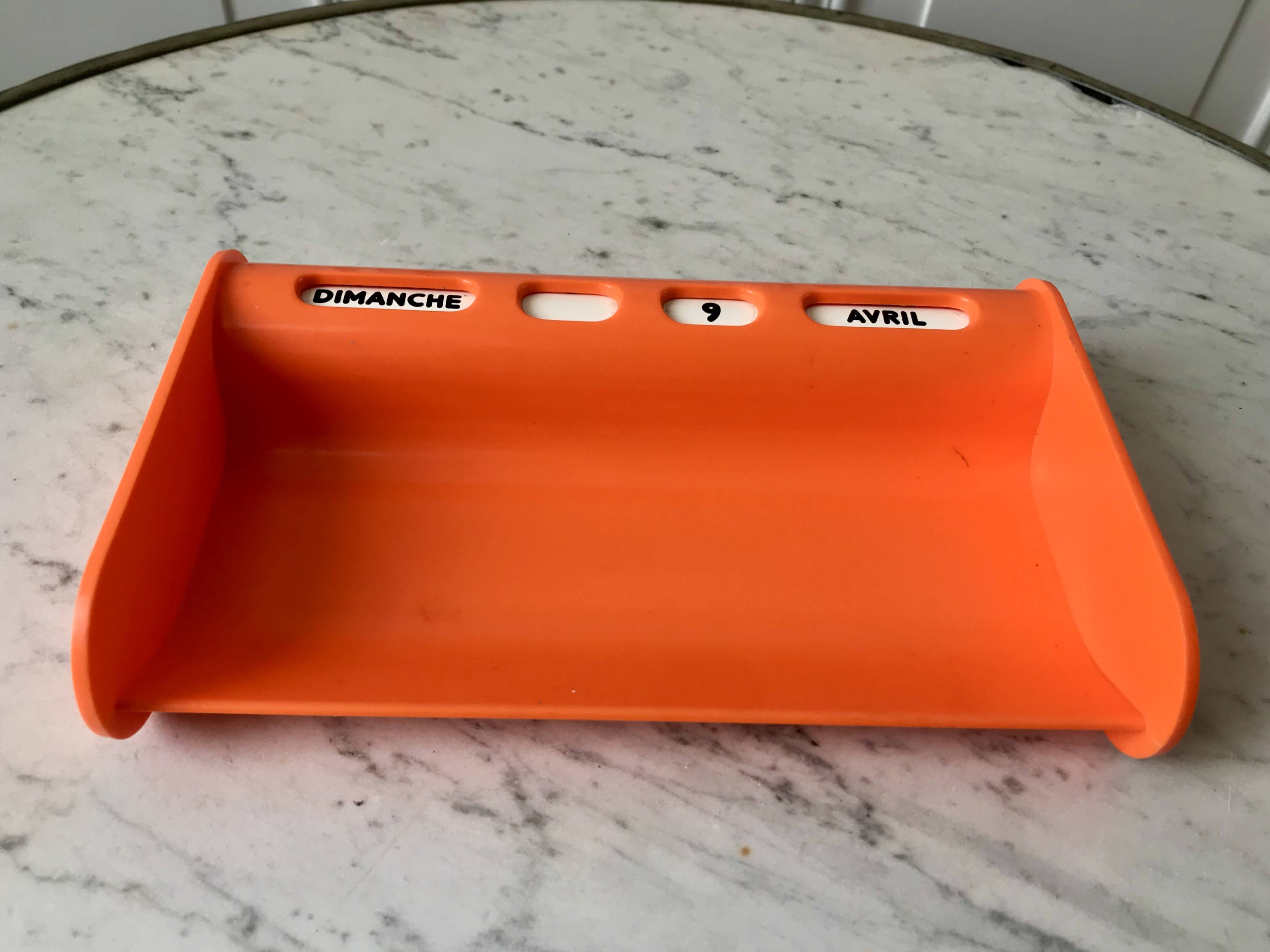 Dater empty pocket in orange plastic seventies 70s