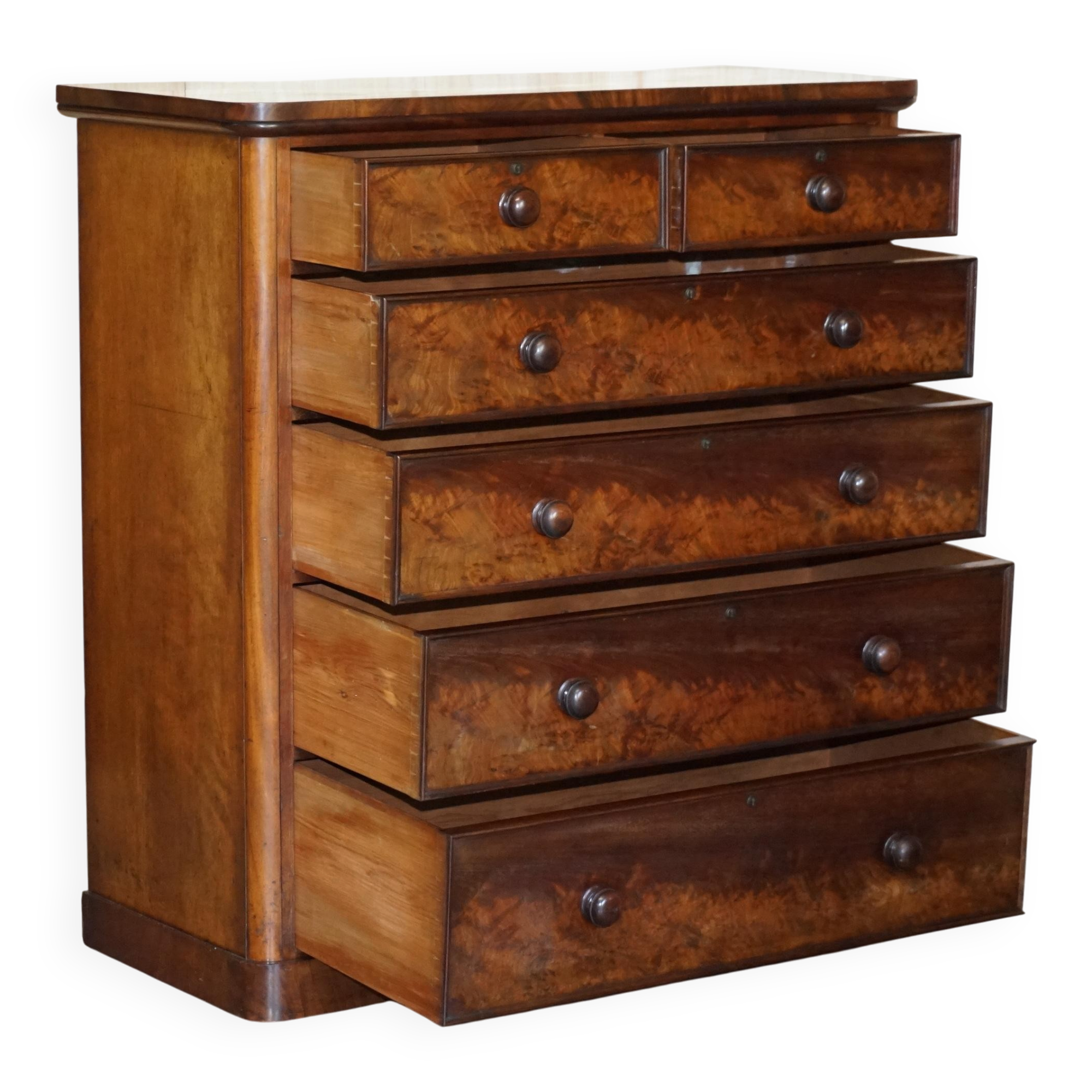 Victorian commode in flame wood with four drawers