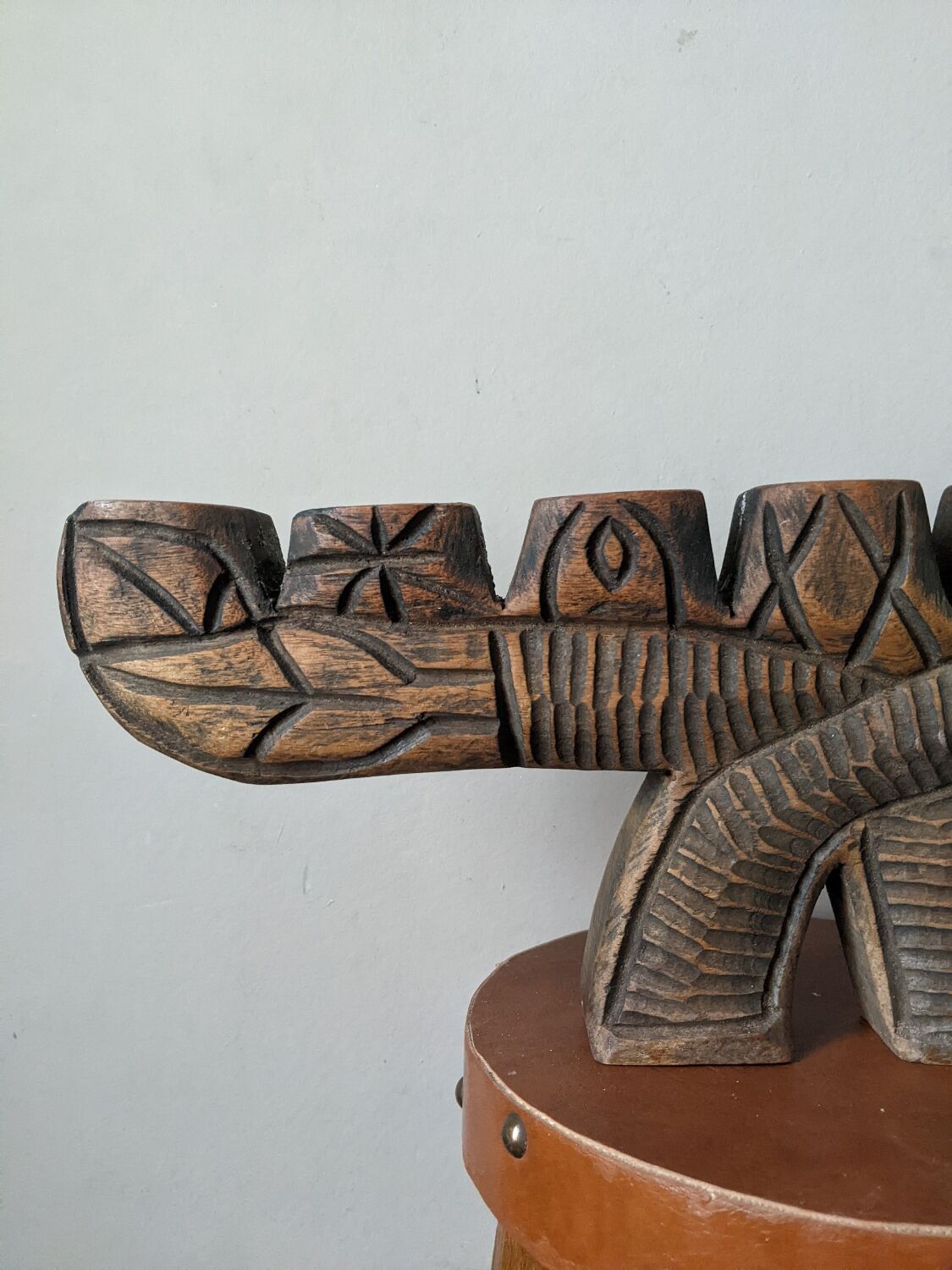 Hand-carved wooden candle holder, ethnic tribal style.